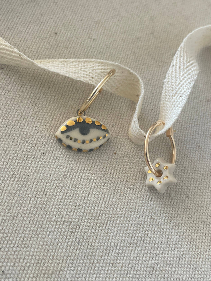 Mismatched Eye + Star earrings
