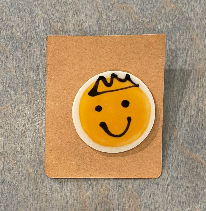 Smiley face ceramic pins