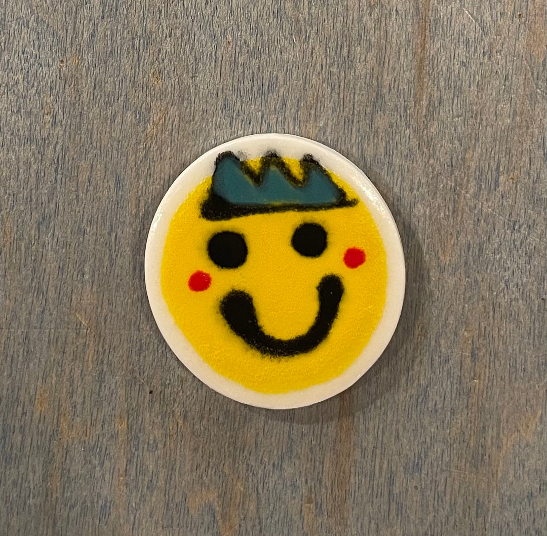 Smiley face ceramic magnet