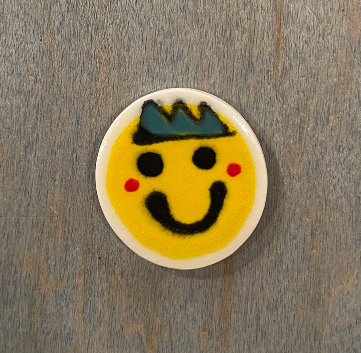 Smiley face ceramic magnet