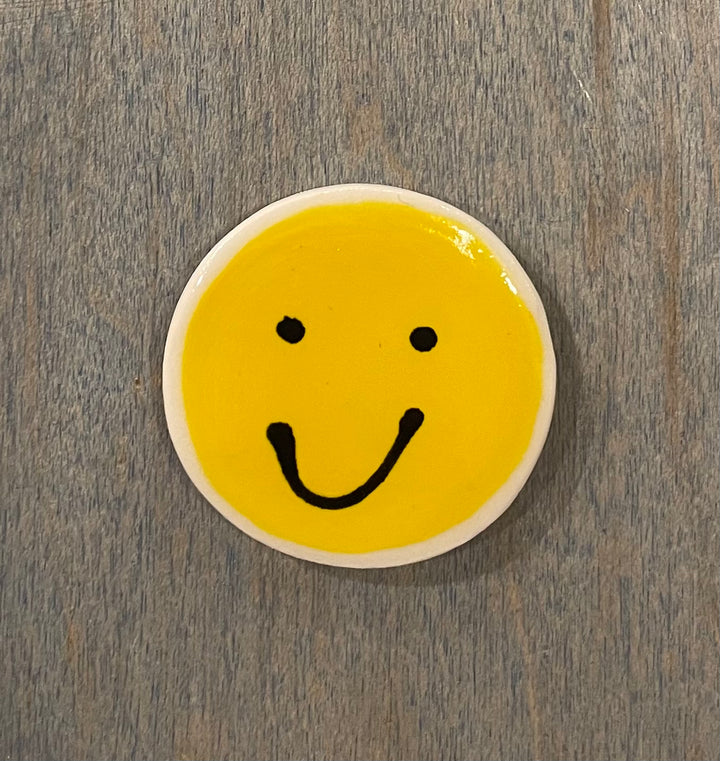 Smiley face ceramic magnet