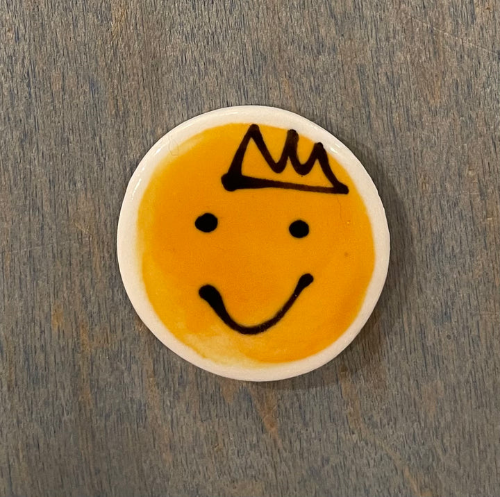 Smiley face ceramic magnet