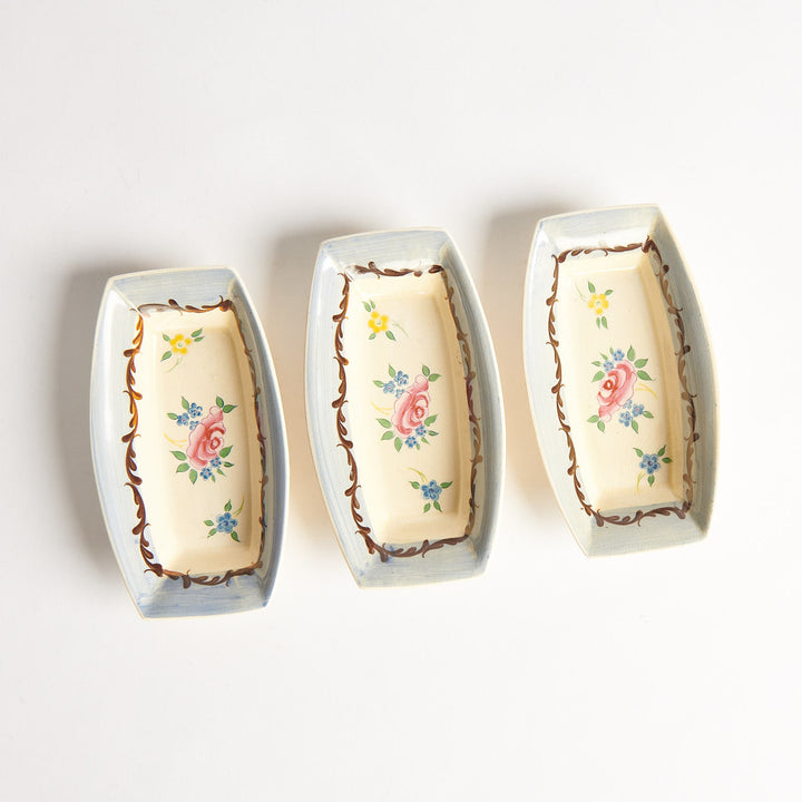 Four Clarice Cliff Floral Decorated Sauce Bowls