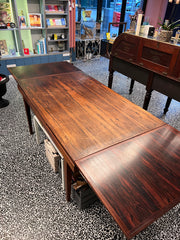 1960'S DANISH ROSEWOOD DRAW-LEAF DINING TABLE